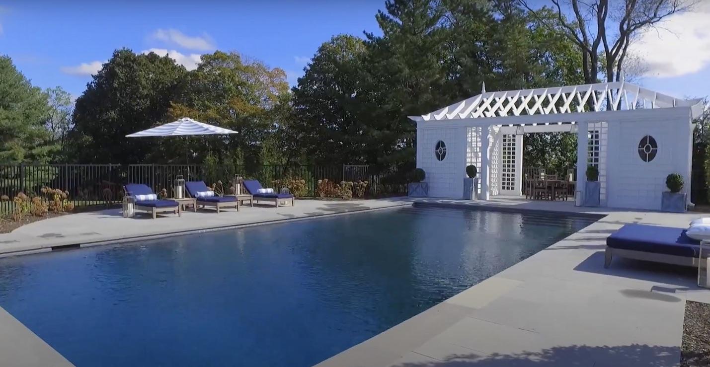 507 Smith Ridge Road New Canaan, CT 06840 - Photo 12 of 16 a view of a house with sitting area and furniture
