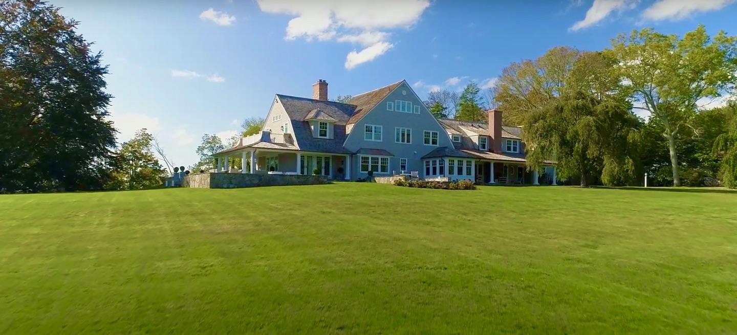 507 Smith Ridge Road New Canaan, CT 06840 - Photo 15 of 16 a view of a house with a big yard