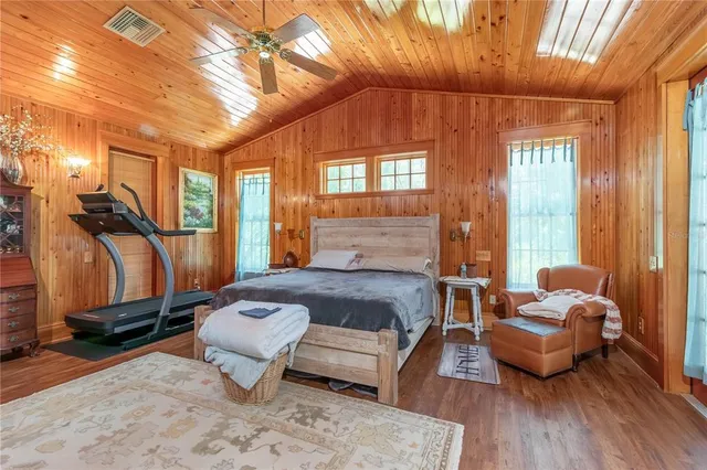 a view of a house with garden and a patio