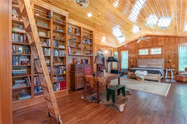 a view of a lake with a house in the background