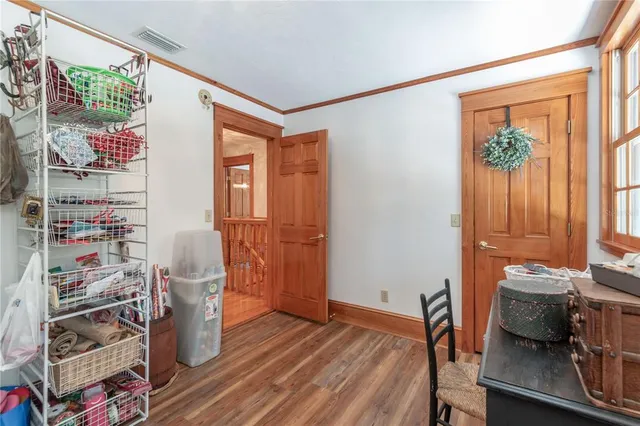 a backyard of a house with yard and outdoor seating