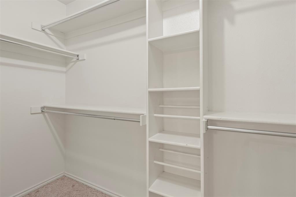 1104 Timberbend Trail Allen, TX 75002 - Photo 20 of 32 a view of an empty walk in closet