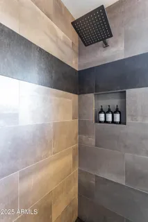 a view of a backyard with swimming pool