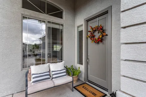 a view of an entryway door and the front door