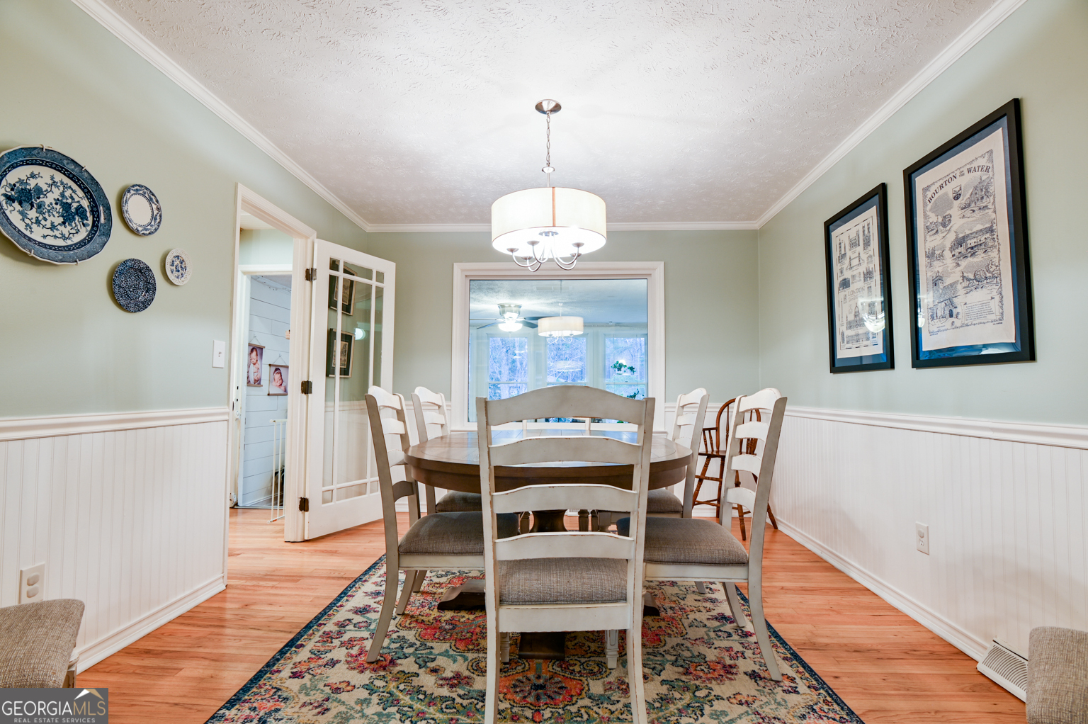 93 Deerfield Road Covington, GA 30014 - Photo 13 of 78 a view of a dining room with furniture window and wooden floor