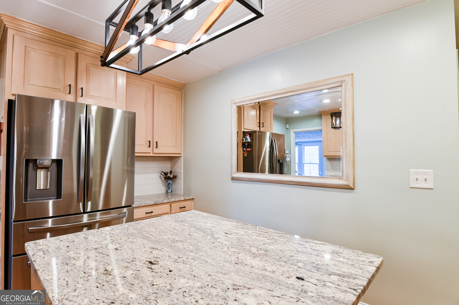 93 Deerfield Road Covington, GA 30014 - Photo 20 of 78 a kitchen with stainless steel appliances granite countertop a refrigerator and a sink