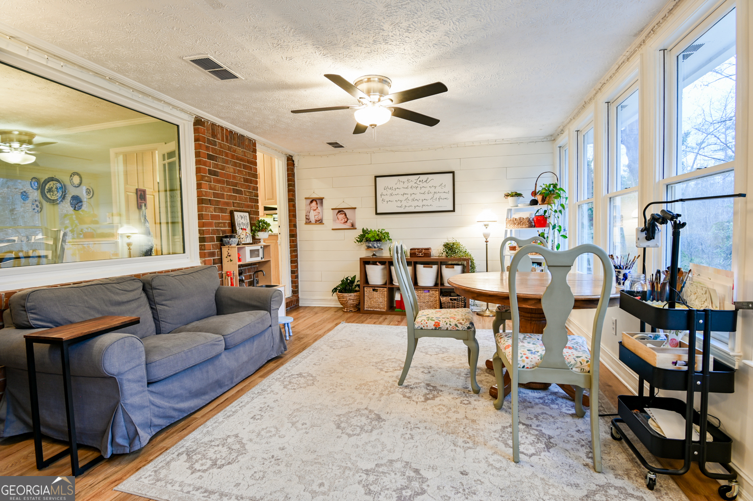 93 Deerfield Road Covington, GA 30014 - Photo 25 of 78 a living room with furniture and a large window