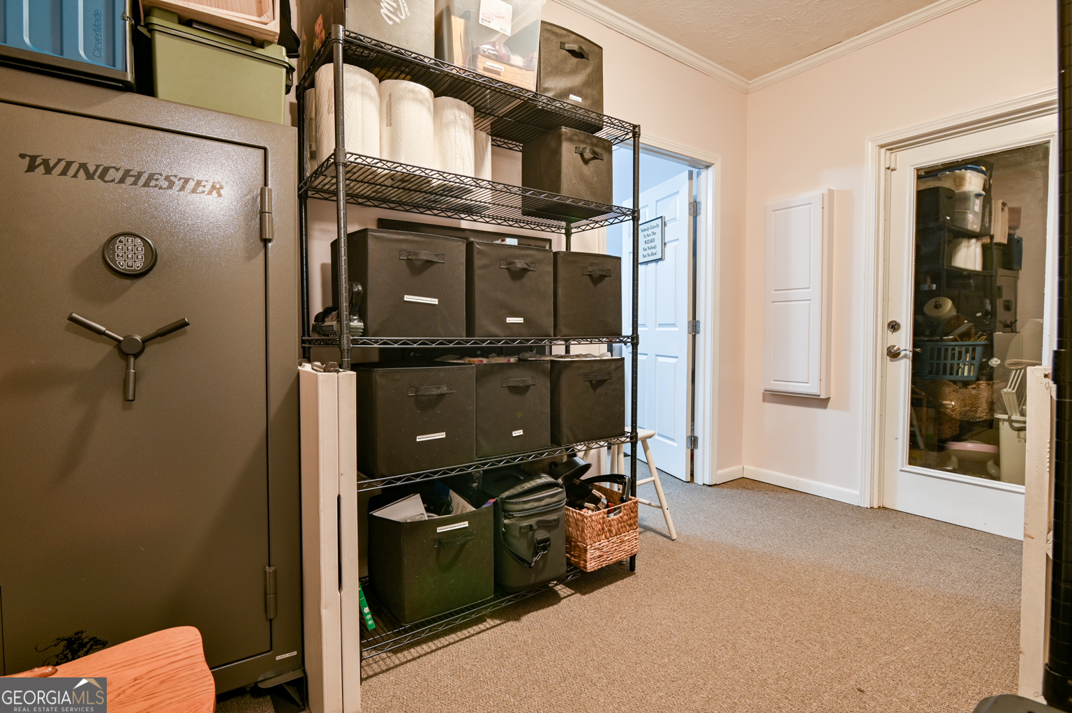 93 Deerfield Road Covington, GA 30014 - Photo 26 of 78 a view of a storage & utility room