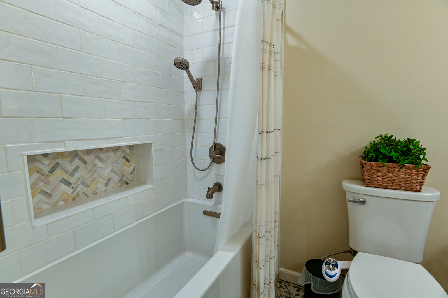 93 Deerfield Road Covington, GA 30014 - Photo 35 of 78 a bathroom with a toilet and a shower