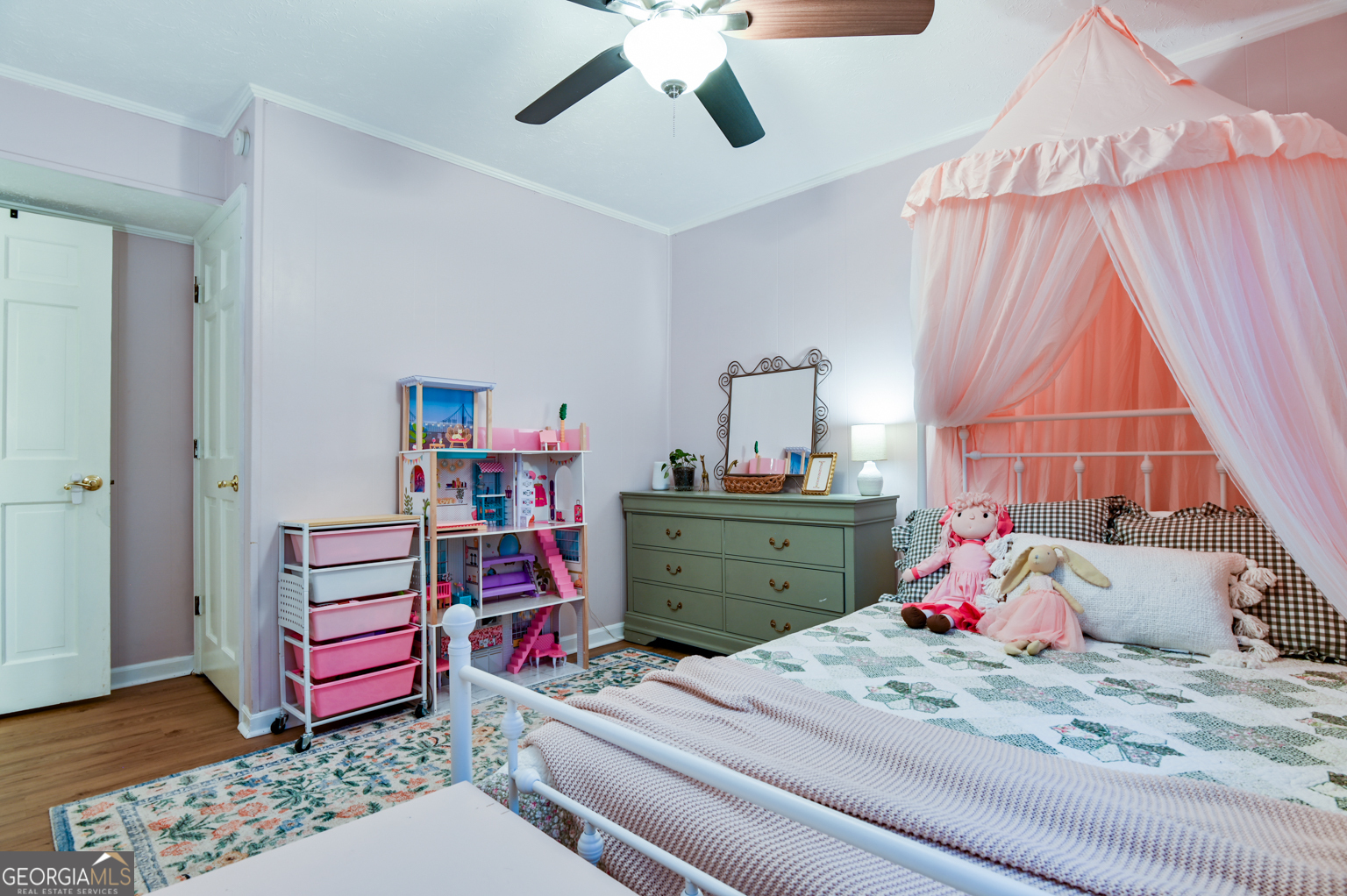93 Deerfield Road Covington, GA 30014 - Photo 48 of 78 a bedroom with a bed and a dresser
