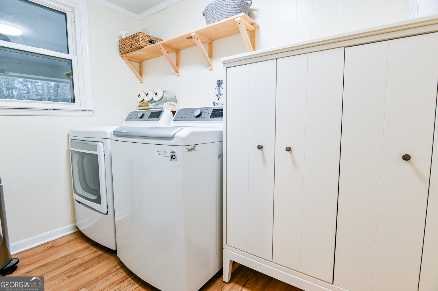 93 Deerfield Road Covington, GA 30014 - Photo 54 of 78 a utility room with dryer and washer