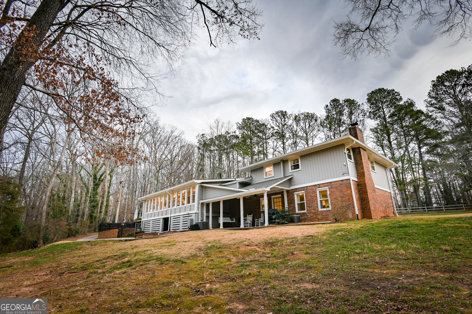 93 Deerfield Road Covington, GA 30014 - Photo 61 of 78 a front view of a house with a garden