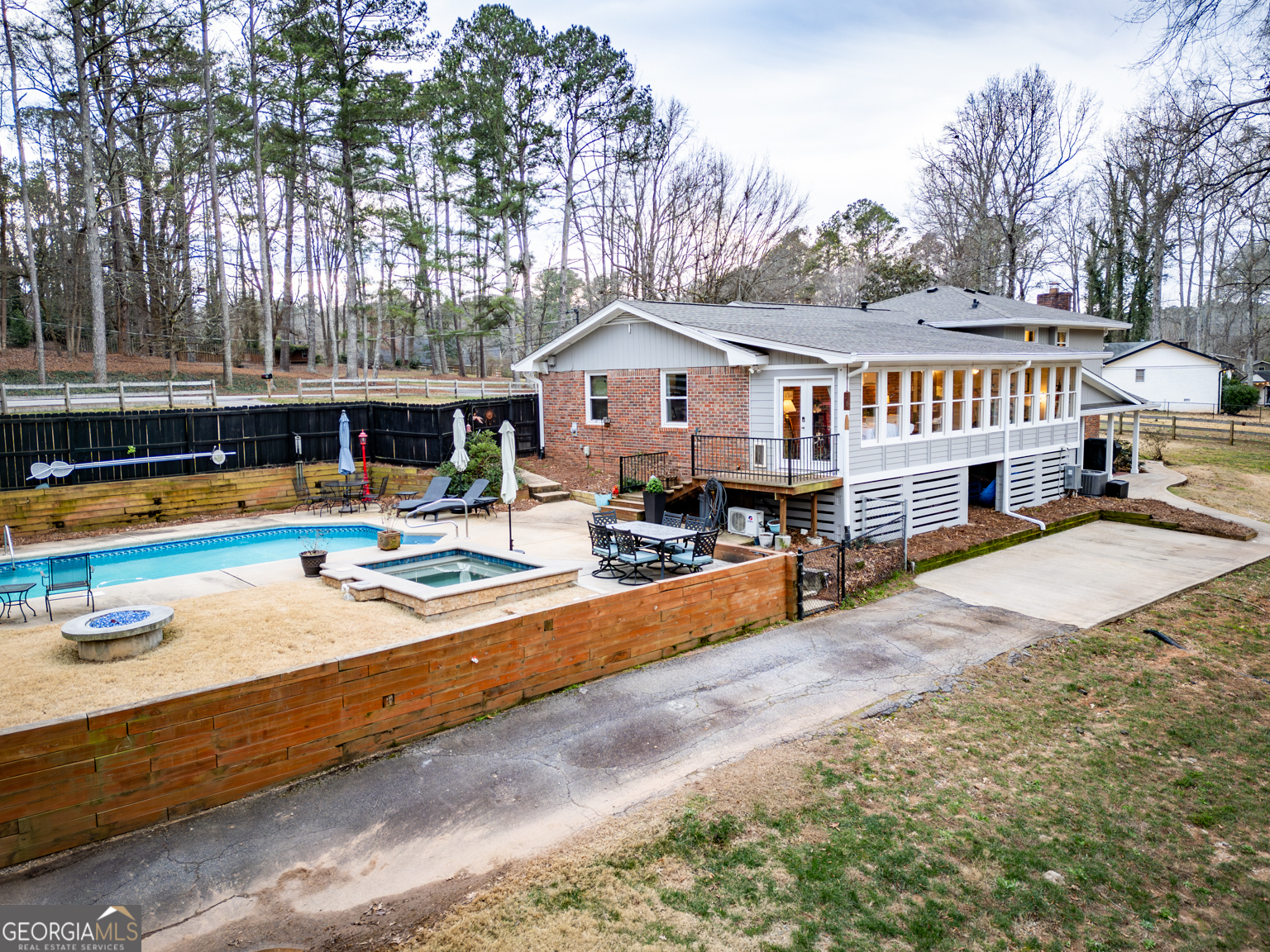 93 Deerfield Road Covington, GA 30014 - Photo 62 of 78 a view of a house with swimming pool and sitting area