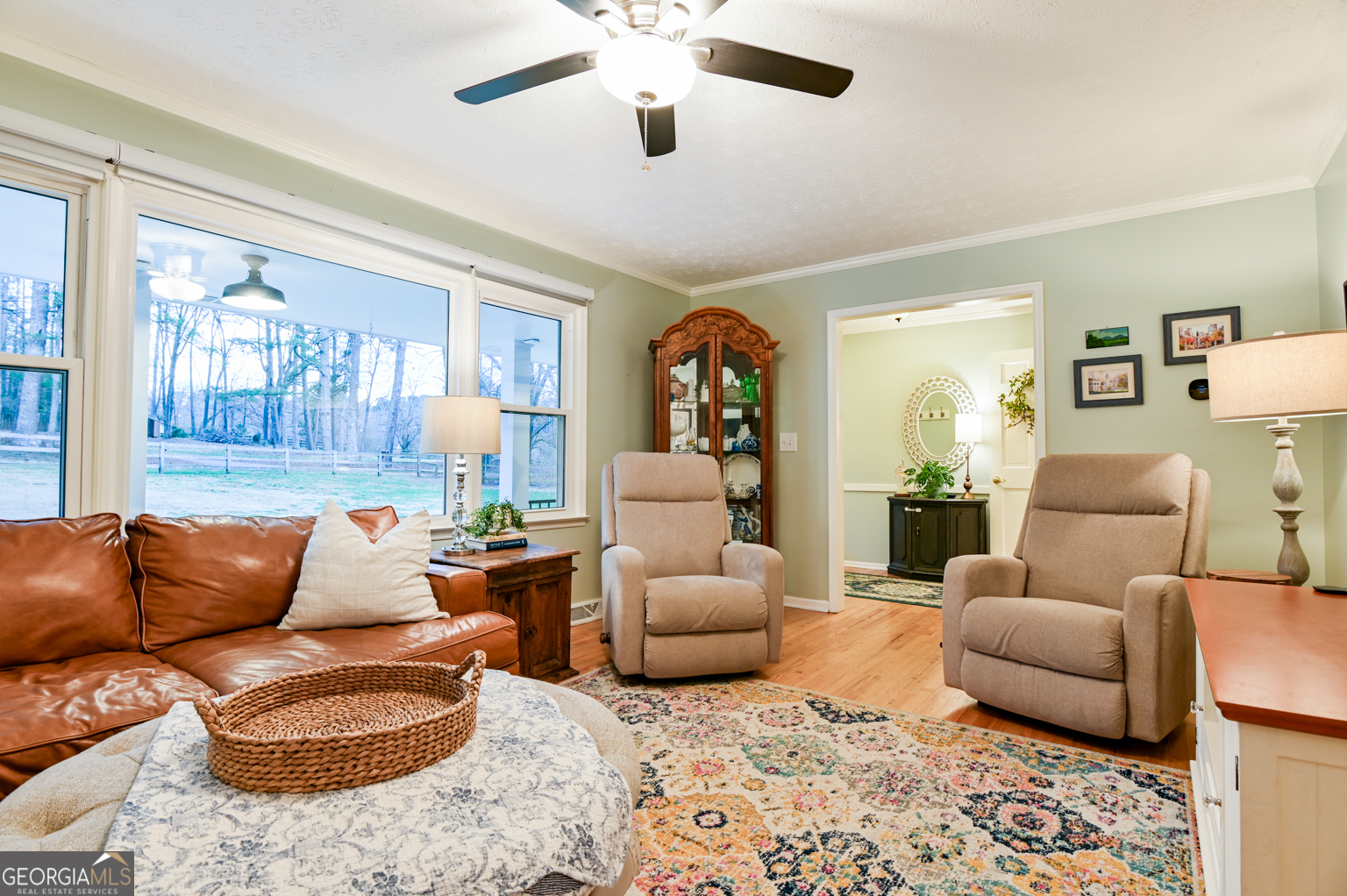 93 Deerfield Road Covington, GA 30014 - Photo 10 of 78 a living room with furniture and a large window