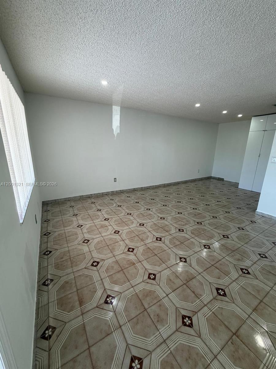 11511 Southwest 180th Street Miami, FL 33157 - Photo 11 of 22 a view of a hallway