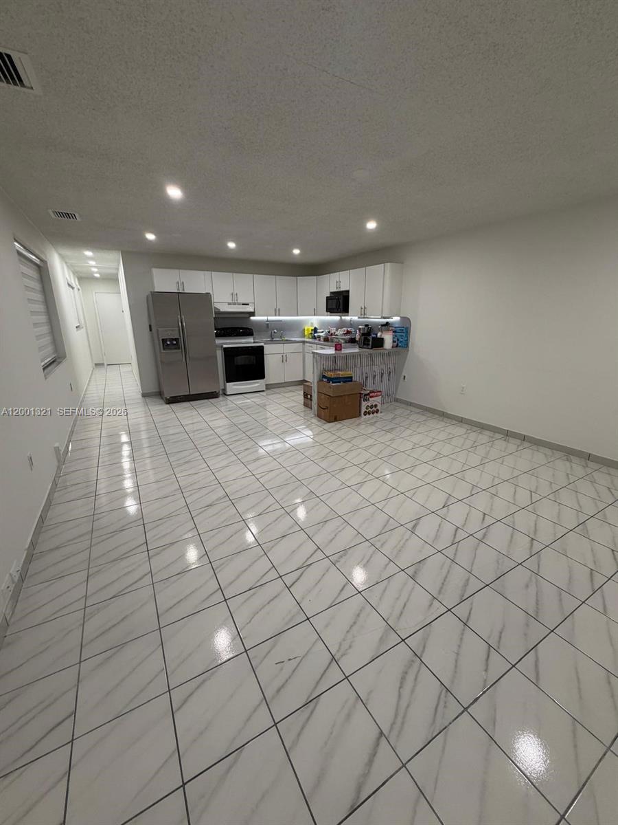 11511 Southwest 180th Street Miami, FL 33157 - Photo 22 of 22 a living room with furniture