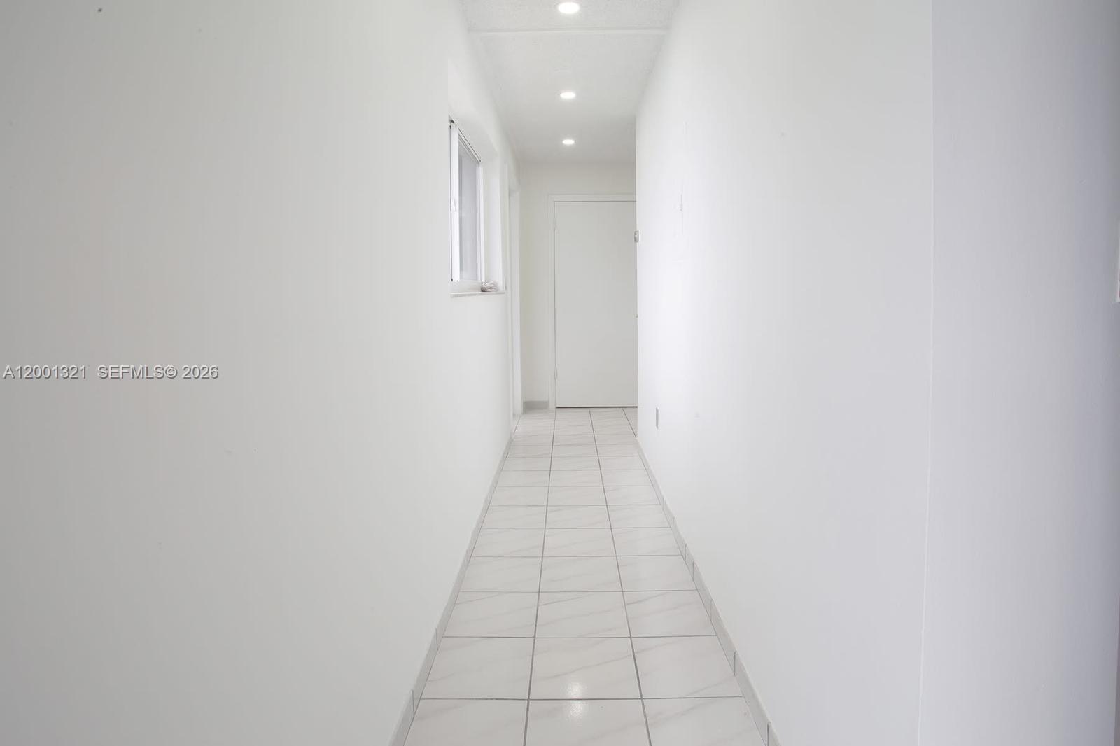 11511 Southwest 180th Street Miami, FL 33157 - Photo 7 of 22 a view of a hallway
