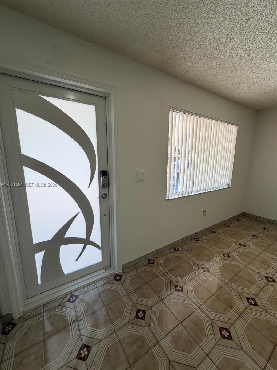 11511 Southwest 180th Street Miami, FL 33157 - Photo 10 of 22 a view of an entryway