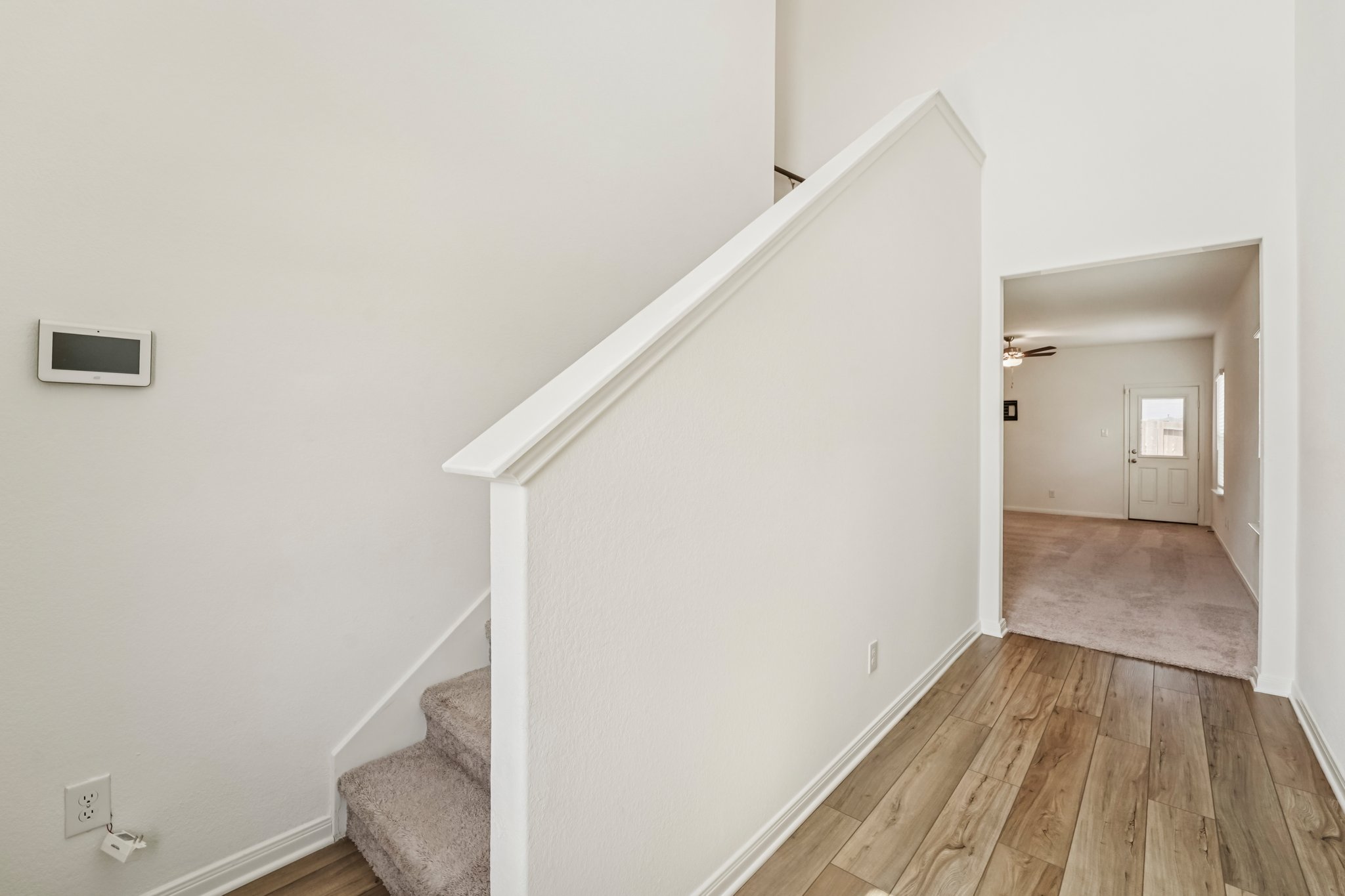 571 Aplite Pass Maxwell, TX 78656 - Photo 14 of 28 a view of hallway with wooden floor