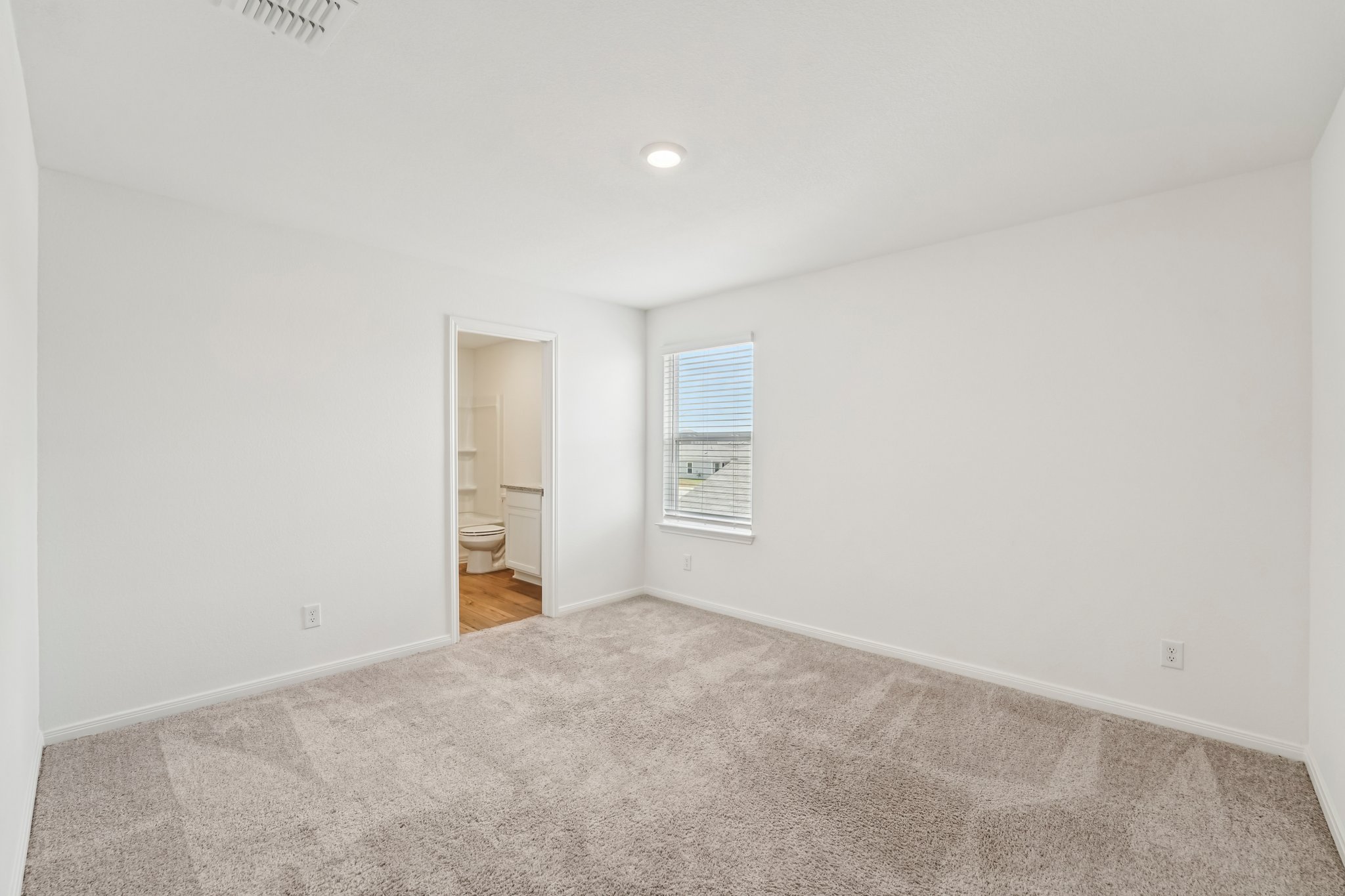 571 Aplite Pass Maxwell, TX 78656 - Photo 24 of 28 a view of an empty room with a window