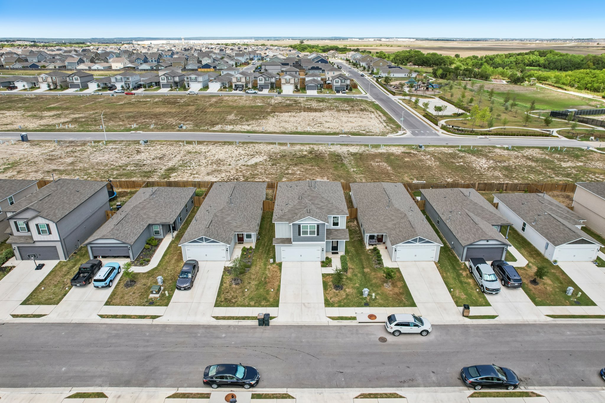 571 Aplite Pass Maxwell, TX 78656 - Photo 28 of 28 an aerial view of residential houses with outdoor space