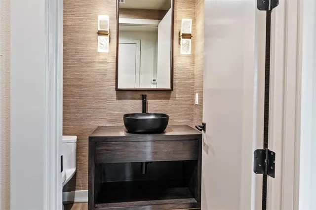 a view of kitchen with a sink and a stove