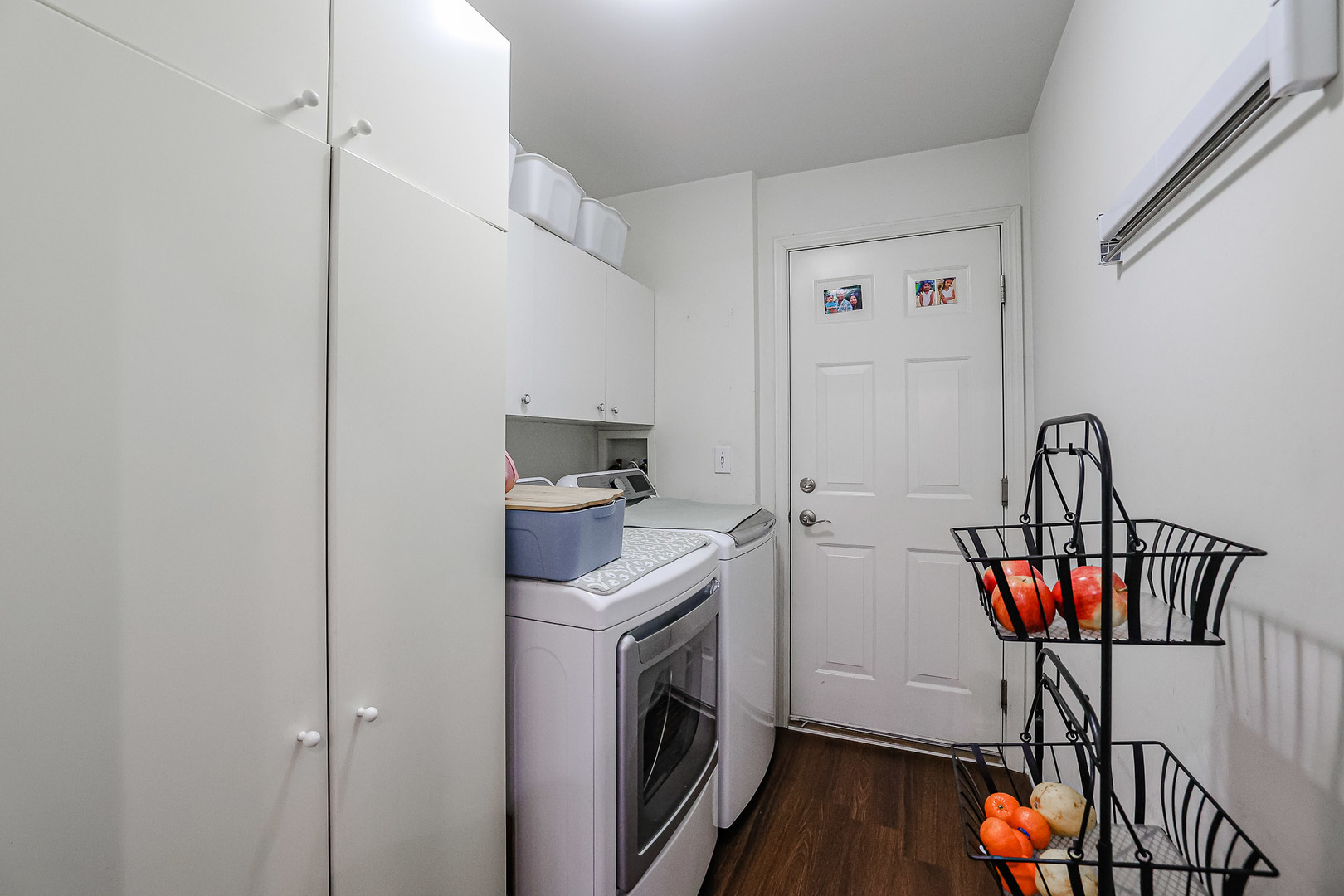 1322 Tamarack Drive Bartlett, IL 60103 - Photo 17 of 30 a room with furniture a washer and dryer