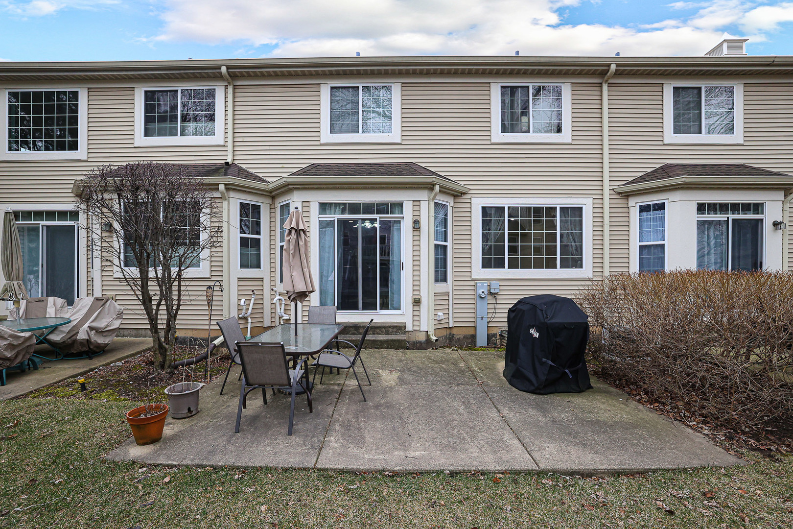 1322 Tamarack Drive Bartlett, IL 60103 - Photo 28 of 30 a view of a house with backyard and sitting area