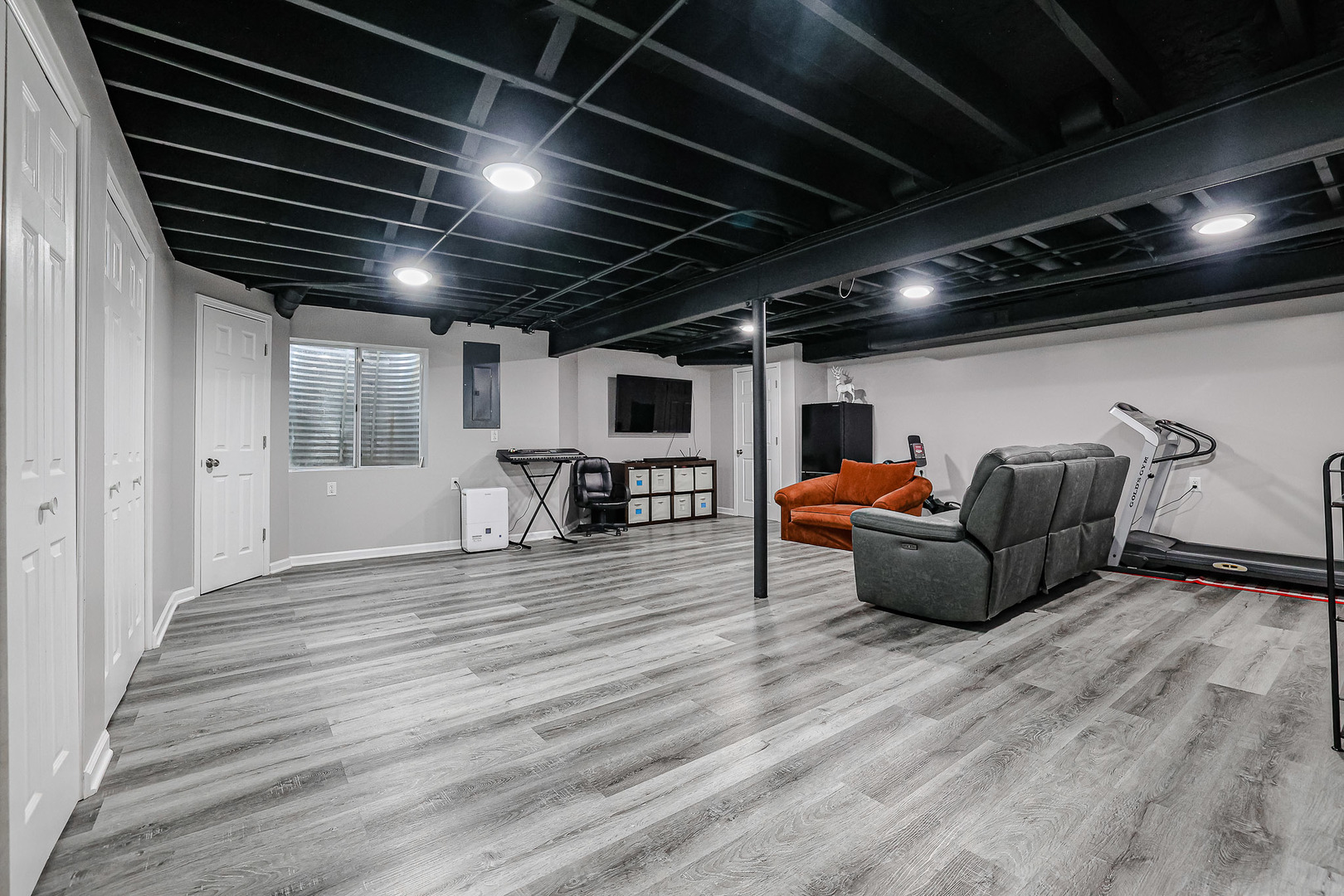 1322 Tamarack Drive Bartlett, IL 60103 - Photo 3 of 30 a living room with furniture and a wooden floor
