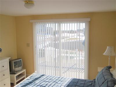 8 Sumac Road West Dennis, MA 02670 - Photo 16 of 23 a bedroom with a bed and a window