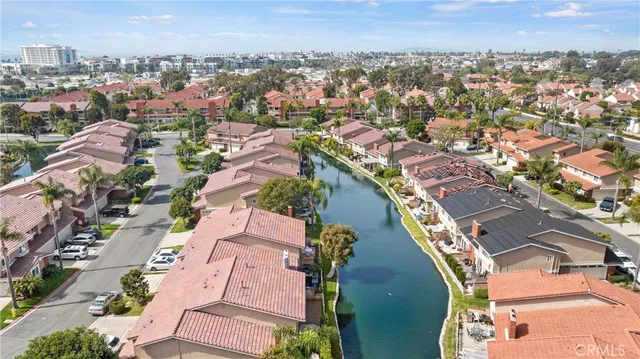 an aerial view of a city with lots of residential buildings