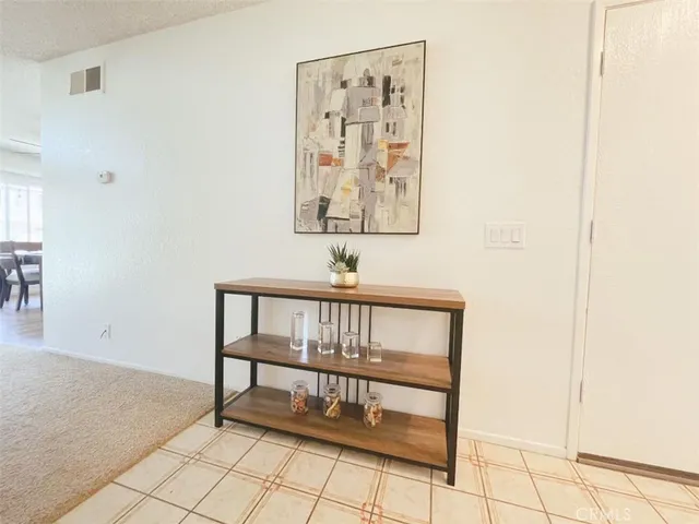 a view of staircase with a rug