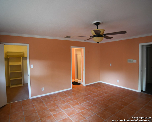 6207 Shady Brook Windcrest, TX 78239 - Photo 13 of 23 a view of a big room with wooden floor