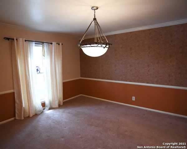 6207 Shady Brook Windcrest, TX 78239 - Photo 17 of 23 an empty room with windows