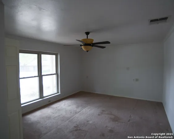 an empty room with a window