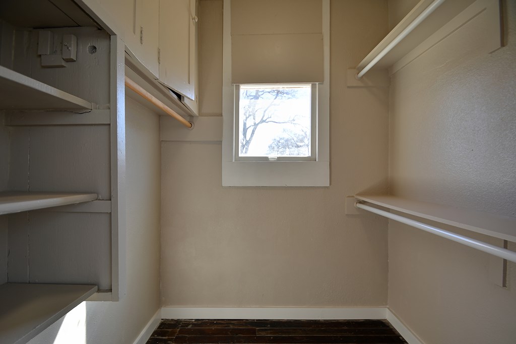 309 Lowry Street Kerrville, TX 78028 - Photo 16 of 29 a view of small space with racks on the wall