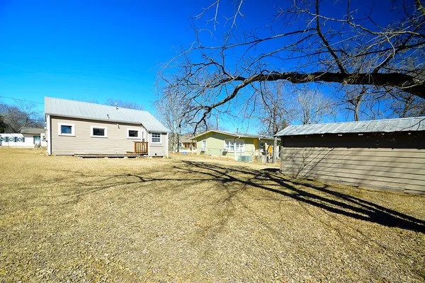 a view of a backyard of a house