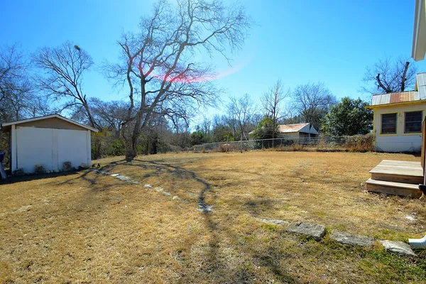 a view of backyard with outdoor space