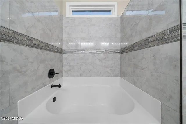 a bathroom with a bathtub