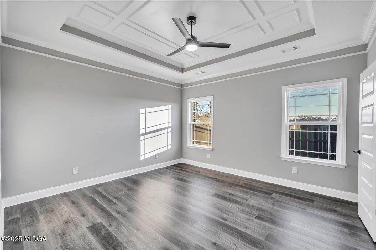 103 Early Drive Byron, GA 31008 - Photo 20 of 44 a view of an empty room with a window and wooden floor