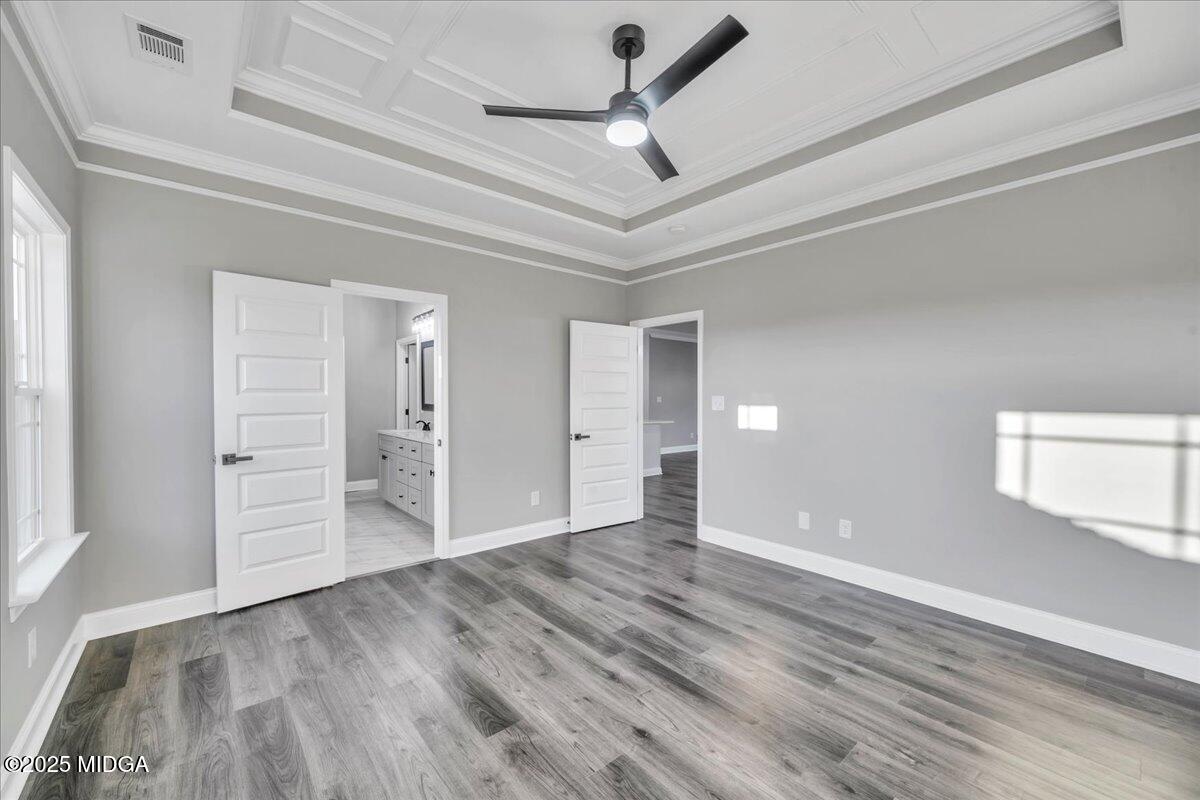 103 Early Drive Byron, GA 31008 - Photo 21 of 44 wooden floor in an empty room with a window