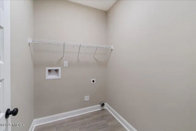 a view of a room with empty racks on the wall