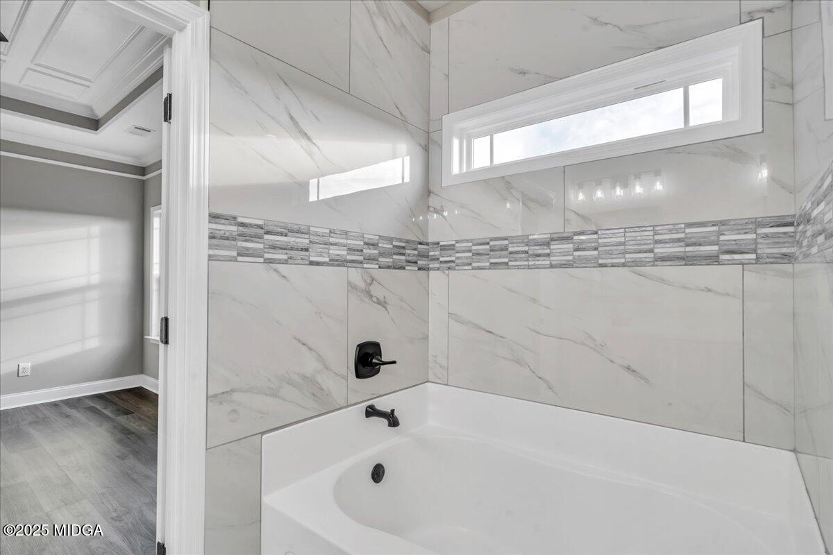 103 Early Drive Byron, GA 31008 - Photo 27 of 44 a bathroom with a tub