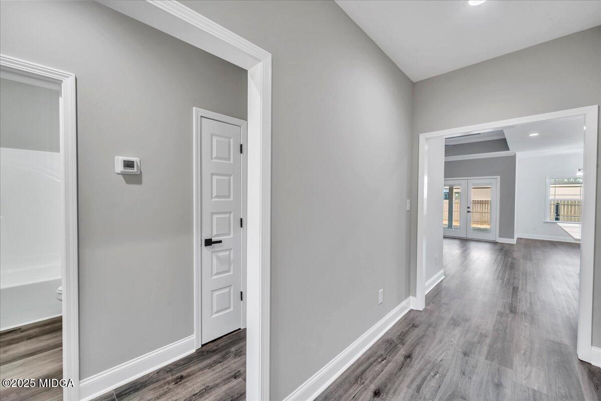 103 Early Drive Byron, GA 31008 - Photo 5 of 44 a view of a hallway with wooden floor