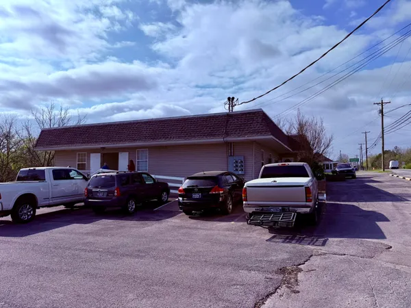 a car parked in front of a house