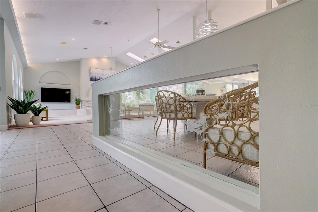 181 South Auburn Road Venice, FL 34292 - Photo 49 of 91 a lobby with furniture and a potted plant