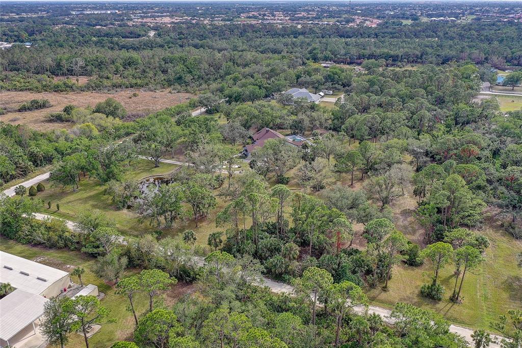 181 South Auburn Road Venice, FL 34292 - Photo 68 of 91 an aerial view of forest
