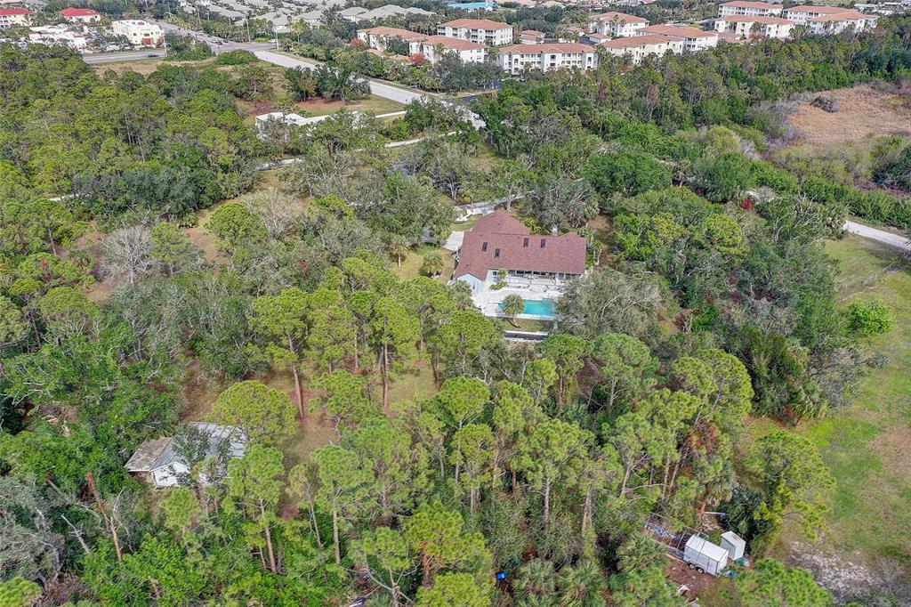 181 South Auburn Road Venice, FL 34292 - Photo 71 of 91 a aerial view of a house with a yard