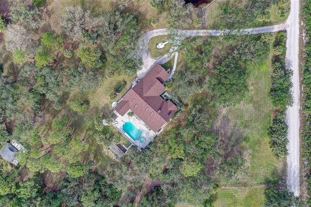 181 South Auburn Road Venice, FL 34292 - Photo 82 of 91 an aerial view of houses with yard