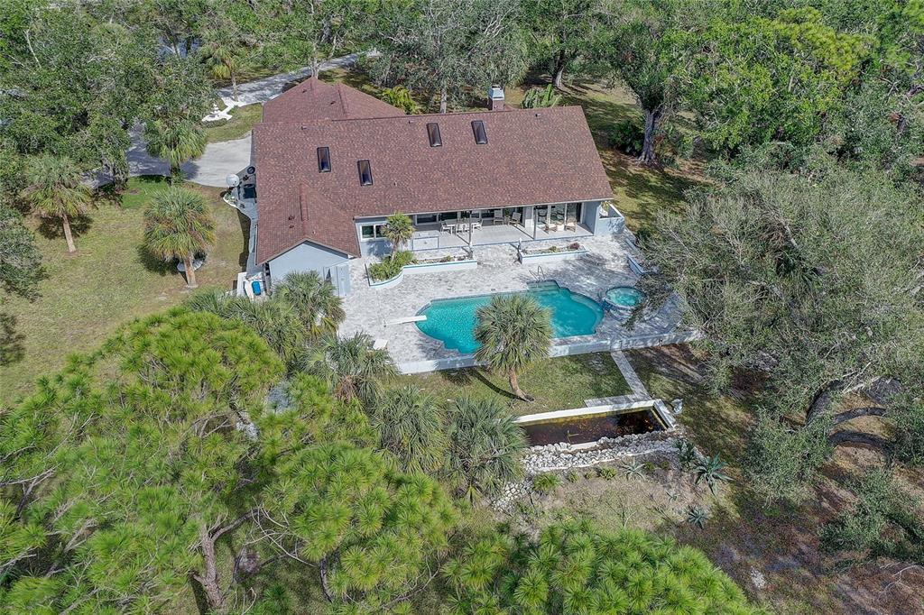 181 South Auburn Road Venice, FL 34292 - Photo 84 of 91 an aerial view of house with yard